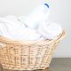 Laundry-Basket-with-White-Clothes-and-Detergent-On