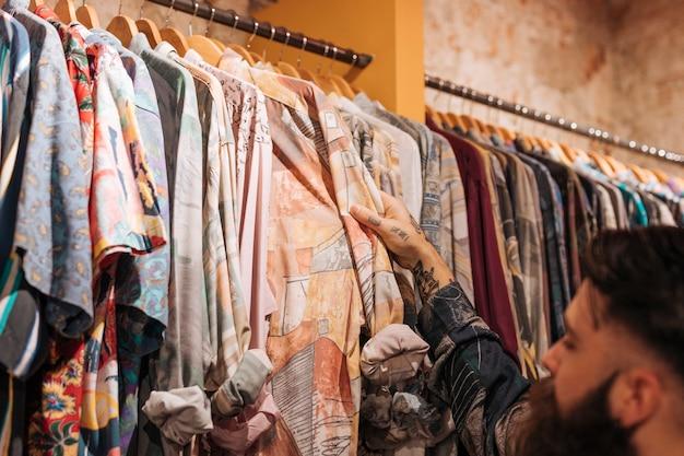 how to save money on clothing - Consider Buying Second-Hand Clothes