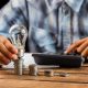 man-cunting-stack-coins-freepik