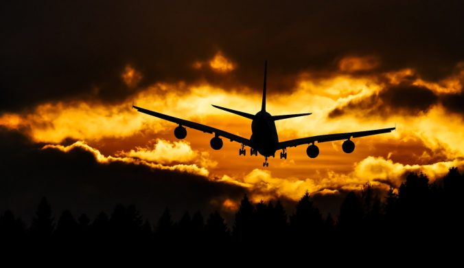 Airplane Silhouette on Air during Sunset