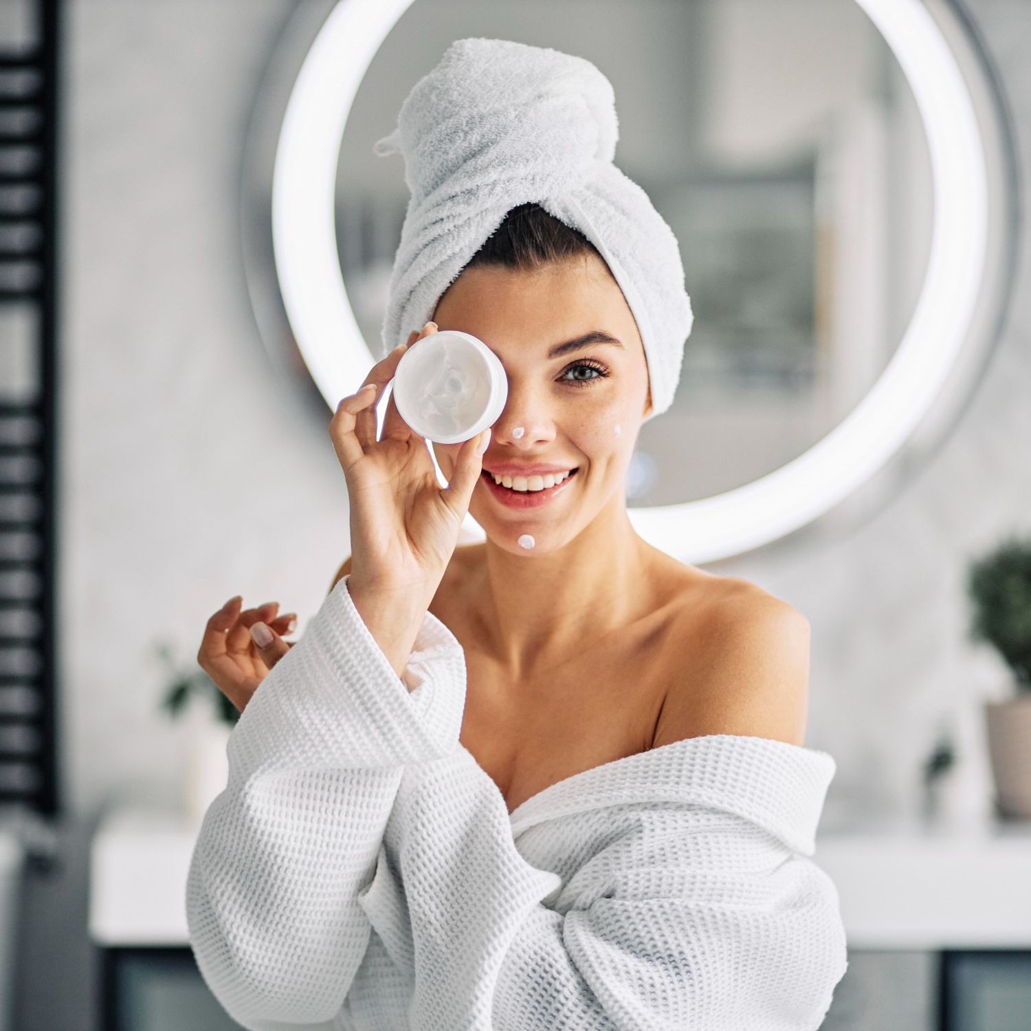 woman-doing-her-morning-skincare-routine